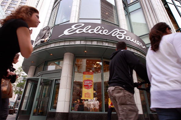 Pedestrians walk past an Eddie Bauer store along Michigan Avenue June 17, 2009 in Chicago, Illinois.