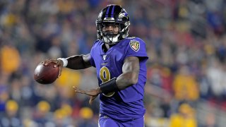 Nov 25, 2019; Los Angeles, CA, USA; Baltimore Ravens quarterback Lamar Jackson (8) throws a pass against the Los Angeles Rams during the first half at Los Angeles Memorial Coliseum. Mandatory Credit: Kirby Lee-USA TODAY Sports