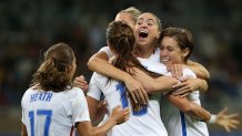 Rio Olympics Soccer Women hug each other