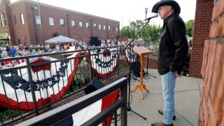 Trace Adkins performs during a memorial service for musician Charlie Daniels