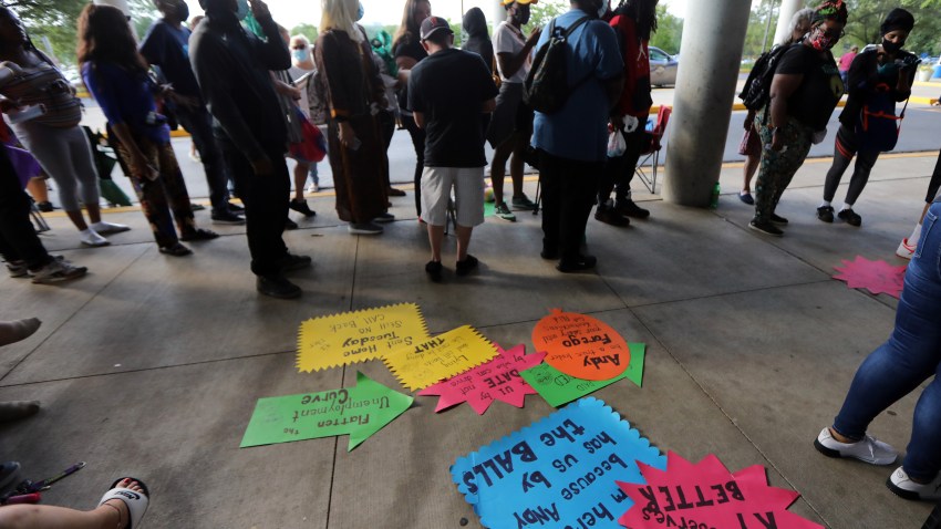 Hundreds of unemployed Kentucky residents wait in long lines outside the Kentucky Career Center for help with their unemployment claims on June 19, 2020 in Frankfort, Kentucky.