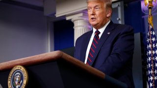 President Donald Trump speaks during a briefing with reporters