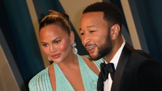 In this Feb. 9, 2020, file photo, Chrissy Teigen and John Legend attend the 2020 Vanity Fair Oscar Party at Wallis Annenberg Center for the Performing Arts in Beverly Hills, California.