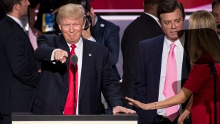 UNITED STATES - NOVEMBER 27: Donald Trump, flanked by campaign manager Paul Manafort and daughter Ivanka, checks the podium early Thursday afternoon in preparation for accepting the GOP nomination to be President at the 2016 Republican National Convention in Cleveland, Ohio on Wednesday July 20, 2016.