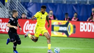 NASHVILLE, TN – AUGUST 30:  Anibal Godoy #20 of Nashville SC dribbles up field as Matias Pellegrini #11 of Inter Miami challenges during the first half at Nissan Stadium on August 30, 2020 in Nashville, Tennessee. (Photo by Brett Carlsen/Getty Images)