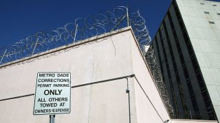 An exterior of Metro Dade Corrections is shown January 22, 2003 in Miami, Florida. Officials stated that grammy-winning rhythm and blues singer R. Kelly was arrested in Miami earlier today on new child pornography charges resulting from the discovery of sex pictures found at his Florida home last year. Kelly, 36-years-old, who also faces child pornography charges in Chicago, Illinois was picked up in the parking lof of Miami’s Grand Bay Hotel and booked in a Miami-Dade County jail. (Photo By Eliot J. Schechter/Getty Images)