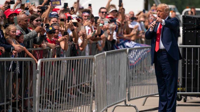President Donald Trump talks to a crowd of supporters after arriving at Wilmington International Airport, Wednesday, Sept. 2, 2020, in Wilmington, N.C.