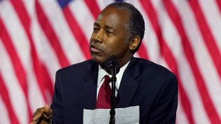 Secretary of Housing and Urban Development Ben Carson holds notes as he speaks during a campaign event before President Donald Trump at the Cobb Galleria Centre, Friday, Sept. 25, 2020, in Atlanta.