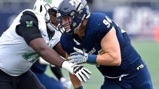 MIAMI, FL – NOVEMBER 24: FIU defensive lineman Kevin Oliver (94) battles Marshall offensive lineman Tarik Adams (71) at the line in the first quarter as the FIU Golden Panthers faced the Marshall University Thundering Herd on November 24, 2018, at Riccardo Silva Stadium in Miami, Florida. (Photo by Samuel Lewis/Icon Sportswire via Getty Images)