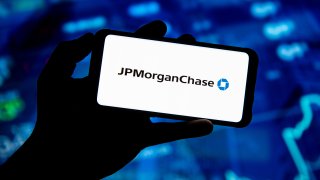 POLAND - 2020/03/19: In this photo illustration a JP Morgan Chase logo seen displayed on a smartphone.
