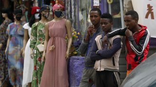 Mannequins with mask are placed in front of a shop to draw attention to the importance of the mask against the coronavirus (COVID-19) pandemic in Addis Ababa, Ethiopia on September 25, 2020.