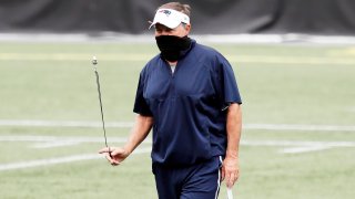 Head coach Bill Belichick of the New England Patriots looks on during training camp at Gillette Stadium on August 28, 2020 in Foxborough, Massachusetts.