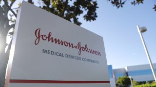 In this Aug. 26, 2019, file photo, a sign is posted at the Johnson & Johnson campus in Irvine, California.