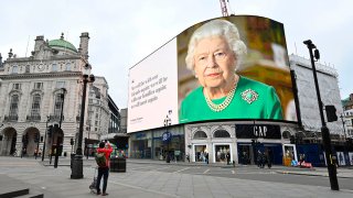 A still image of Britain's Queen Elizabeth II with a message of hope from her special address to the nation is seen on the giant billboard in Piccadilly Square, central London, April 18, 2020.