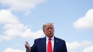 President Donald Trump makes his way to board Air Force One before departing from Andrews Air Force Base in Maryland, Sept. 8, 2020.