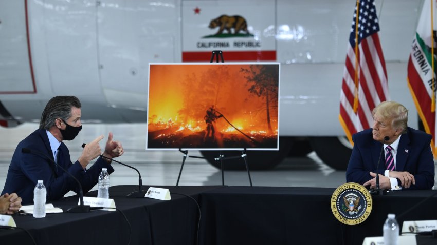 President Donald Trump speaks to California Governor Gavin Newsom