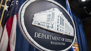In this Aug. 4, 2017, file photo, the Department of Justice logo is seen in Washington, D.C.