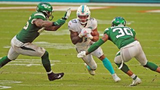 Miami Dolphins running back Myles Gaskin (37) on the run in the second quarter against the New York Jets on Sunday, Oct. 18, 2020 at Hard Rock Stadium in Miami Gardens, Florida. (Charles Trainor Jr./Miami Herald/Tribune News Service via Getty Images)