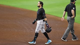 HOUSTON, TEXAS – OCTOBER 06: Miguel Rojas #19 of the Miami Marlins reacts after being out at first to end the fifth inning against the Atlanta Braves in Game One of the National League Division Series at Minute Maid Park on October 06, 2020 in Houston, Texas. (Photo by Elsa/Getty Images)