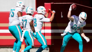 SANTA CLARA, CALIFORNIA – OCTOBER 11: Adam Shaheen #80 of the Miami Dolphins celebrates with teammates after he scored a touchdown against the San Francisco 49ers during the first half of their NFL football game at Levi’s Stadium on October 11, 2020 in Santa Clara, California. (Photo by Thearon W. Henderson/Getty Images)