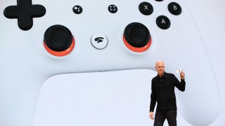 Google vice president and general manager Phil Harrison shows the new Stadia controller as he speaks during the GDC Game Developers Conference on March 19, 2019 in San Francisco, California.