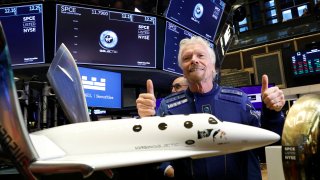 Sir Richard Branson stands on the floor of the New York Stock Exchange (NYSE) ahead of Virgin Galactic (SPCE) trading in New York, U.S., October 28, 2019.