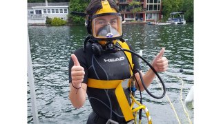 Emily McCarthy at her summer job working to decontaminate Green Pond Lake in Morris County, N.J., to make it safe for swimming and public use.