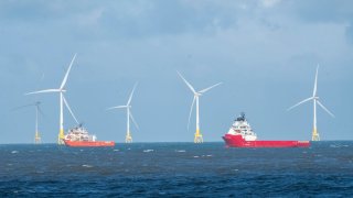 Wind turbines in waters off the coast of Aberdeen, Scotland.