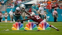 MIAMI GARDENS, FL - DECEMBER 11: Tony Jefferson #22 of the Arizona Cardinals defends against Jay Ajayi #23 of the Miami Dolphins as he runs with the ball on December 11, 2016 at Hard Rock Stadium in Miami Gardens, Florida. Miami defeated Arizona 26-23. (Photo by Joel Auerbach/Getty Images)