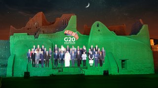 Members of the G20 are projected onto the walls of Salwa Palace