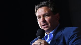 Florida Governor Ron DeSantis speaks during a campaign rally for the US president at Pensacola International Airport in Pensacola, Florida on October 23, 2020. (Photo by MANDEL NGAN / AFP) (Photo by MANDEL NGAN/AFP via Getty Images)