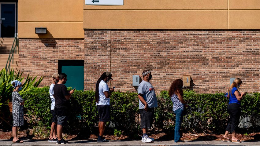 oters line-up to cast their ballots during early voting at the Kissimmee Civic Center in Kissimmee, Florida, on October 30, 2020.