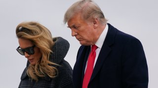 President Donald Trump and first lady Melania Trump step off Air Force One at Andrews Air Force Base, Md., Thursday, Dec. 31, 2020. Trump is returning to Washington after visiting his Mar-a-Lago resort.