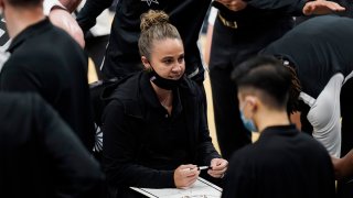San Antonio Spurs assistant coach Becky Hammon calls a play during a timeout in the second half of the team's NBA basketball game against the Los Angeles Lakers in San Antonio, Wednesday, Dec. 30, 2020.