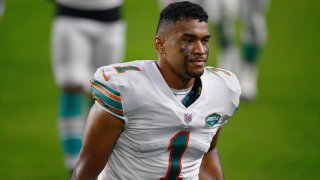 MIAMI GARDENS, FLORIDA – NOVEMBER 15: Tua Tagovailoa #1 of the Miami Dolphins leaves the field after the game against the Los Angeles Chargers at Hard Rock Stadium on November 15, 2020 in Miami Gardens, Florida. (Photo by Mark Brown/Getty Images)