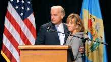 Vice president Joe Biden, left, stands with his sister Valerie Biden Owens, right, before Owens received an award during a dinner held by The Ministry of Caring charity Tuesday, Nov. 16, 2010 in Wilmington, Del. (AP Photo/Steve Ruark)