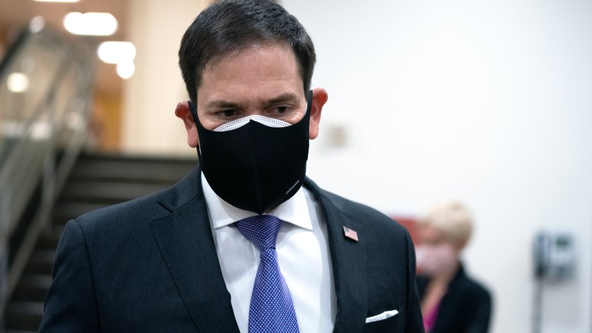 WASHINGTON, DC – DECEMBER 11: U.S. Sen. Marco Rubio (R-FL) wears a protective mask while walking through the Senate Subway at the U.S. Capitol on December 11, 2020 in Washington, DC. The Senate passed a one week stop-gap bill on Friday, avoiding a partial government shutdown.