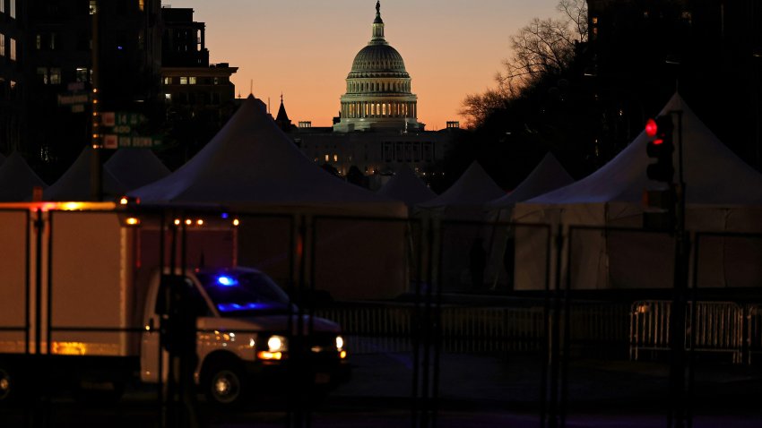 WASHINGTON, DC – JANUARY 16: The U.S. Capitol is seen behind barricades and a checkpoint during sunrise on January 16, 2021 in Washington, DC. After last week’s riots at the U.S. Capitol Building, the FBI has warned of additional threats in the nation’s capital and in all 50 states. According to reports, as many as 25,000 National Guard soldiers will be guarding the city as preparations are made for the inauguration of Joe Biden as the 46th U.S. President. (Photo by Michael M. Santiago/Getty Images)