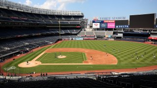 The New York Yankees work out in an empty stadium during summer workouts at Yankee Stadium on July 04, 2020 in the Bronx, New York.