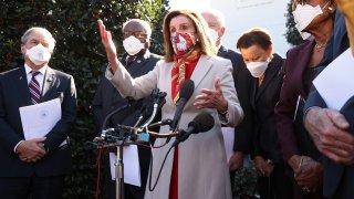 Speaker of the House Nancy Pelosi (D-CA) (C) talks to reporters outside the West Wing after she and House Democratic leaders, including (L-R) Rep. John Yarmuth (R-KY), Majority Whip James Clyburn (D-SC), Rep. Nydia Velazquez (D_NY) and others met with U.S. President Joe Biden to discuss coronavirus relief legislation at the White House February 5, 2021 in Washington, DC.