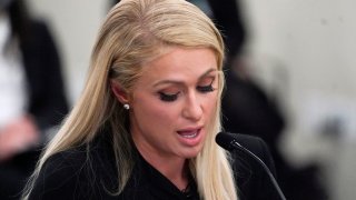 Paris Hilton speaks at a committee hearing at the Utah State Capitol, Monday, Feb. 8, 2021, in Salt Lake City. Hilton has been speaking out about abuse she says she suffered at a boarding school in Utah in the 1990s and she testified in front of state lawmakers weighing new regulations for the industry.