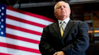 US radio talk show host and conservative political commentator Rush Limbaugh looks on before introducing US President Donald Trump to deliver remarks at a Make America Great Again rally in Cape Girardeau, MO, on November 5, 2018. (Photo by Jim WATSON / AFP) (Photo by JIM WATSON/AFP via Getty Images)