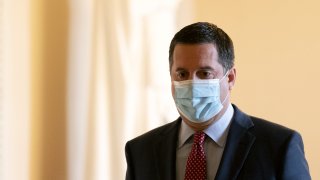 Representative Devin Nunes, a Republican from California, wears a protective mask while walking through the U.S. Capitol in Washington, D.C., U.S. on Monday, Jan. 4, 2021. The non-stop drama of 2020 is bleeding into the first week of the new year, with a pivotal election in Georgia, promises of protests in the streets and President Trump's dragged-out fight over the November vote threatening to tear apart the Republican Party.