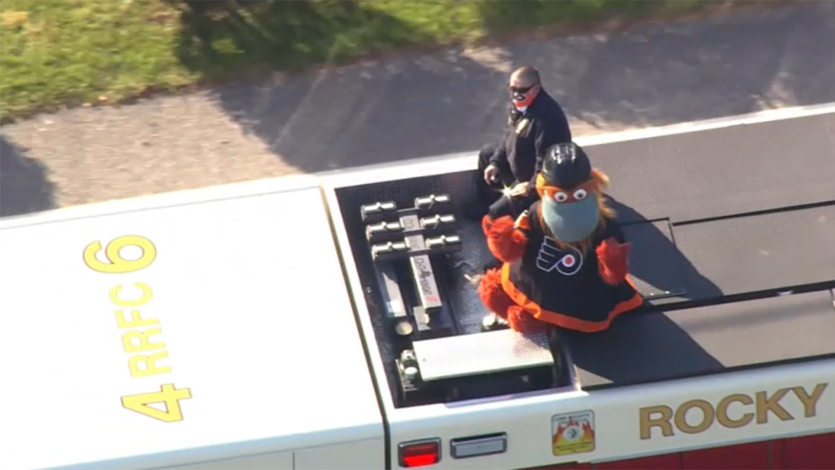 A tradition of drive-through celebration emerged. Gritty raised spirits by riding on a fire truck in Delaware County. (Photo: SkyForce / NBC10)