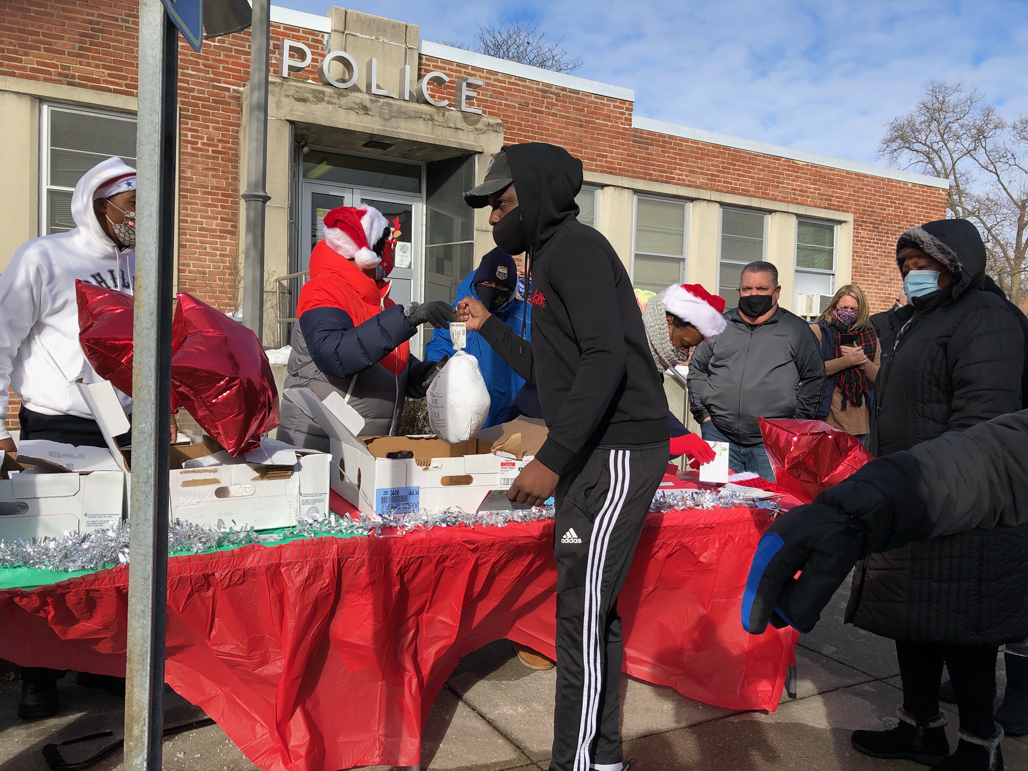 Throughout the year, neighbors helped neighbors and groups fed the hungry. Here, the Fraternal Order of Police sponsor a holiday turkey giveaway in Philadelphia's Germantown neighborhood. (Photo: Dave Palmer / NBC10)