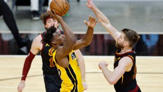 MIAMI, FLORIDA – MARCH 16: Jimmy Butler #22 of the Miami Heat shoots against the Cleveland Cavaliers during the third quarter at American Airlines Arena on March 16, 2021 in Miami, Florida. NOTE TO USER: User expressly acknowledges and agrees that, by downloading and or using this photograph, User is consenting to the terms and conditions of the Getty Images License Agreement. (Photo by Michael Reaves/Getty Images)