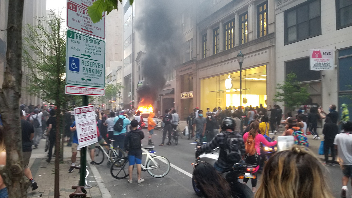 After what had been peaceful, if angry, protests, looters began ransacking stores in commercial corridors, including Walnut Street in Center City. (Photo: Dave Palmer / NBC10)