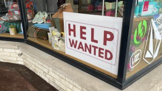 A help wanted sign at a Cape Cod business