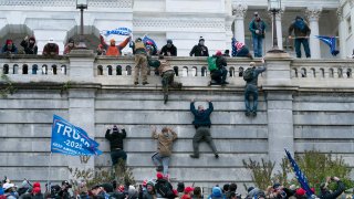 Capitol Riot Trump signs