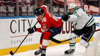 Aleksander Barkov #16 of the Florida Panthers skates for possession against Esa Lindell #23 of the Dallas Stars at the BB&T Center on May 3, 2021 in Sunrise, Florida.